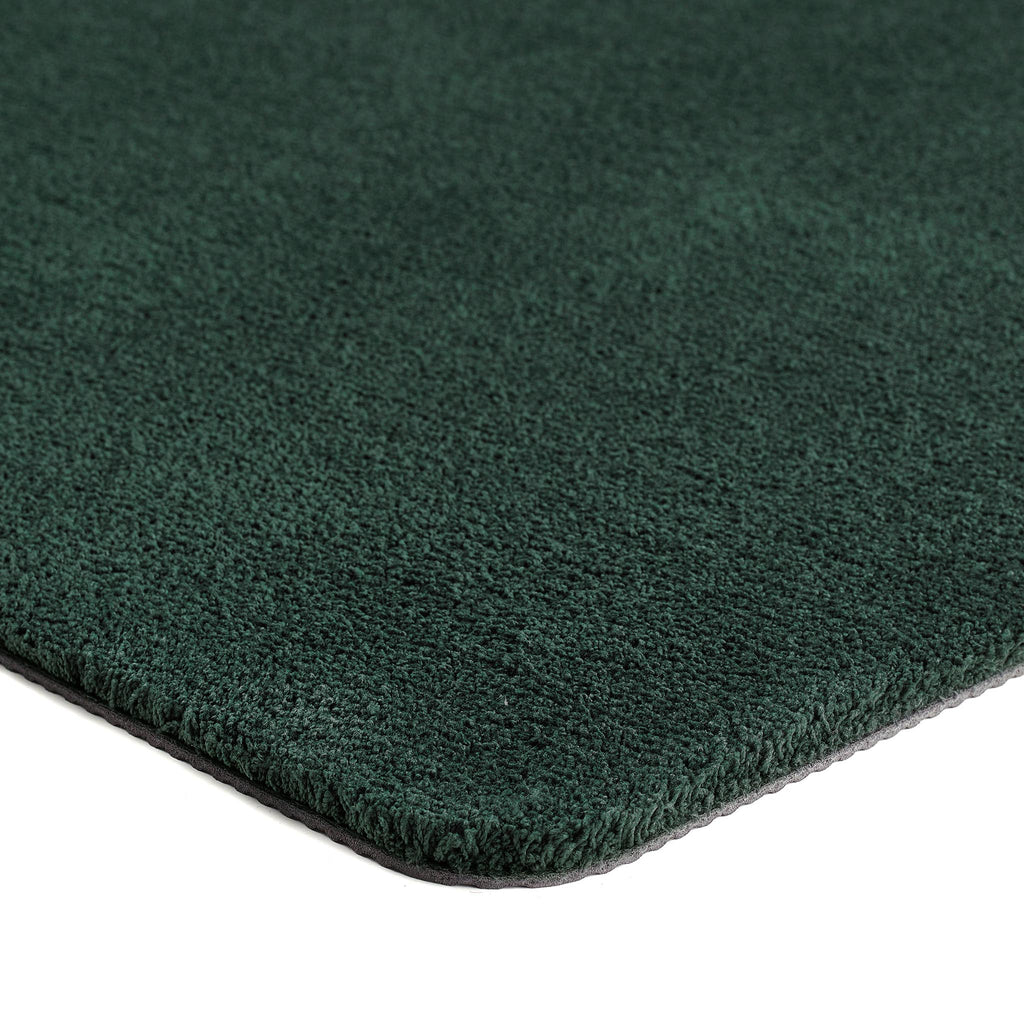 Sense Forest Green Bath Mat- a bath mat made from recycled materials in a solid dark green.