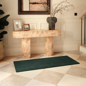 Sense Forest Green Washable Runner- a 100% recycled polyester runner in a solid green.