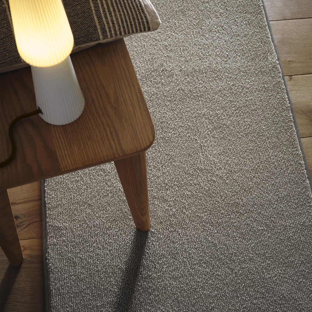 Sense Ghost Grey Washable Runner- a 100% recycled polyester runner in a solid light grey colour.