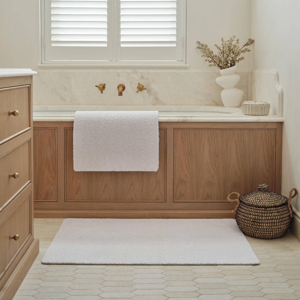 Sense Pumice Stone Bath Mat- a bath mat made from recycled materials in a solid cream.