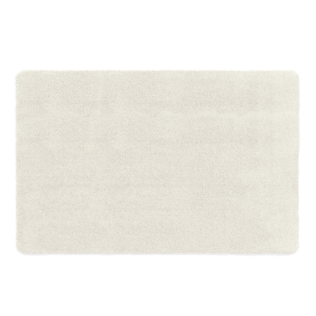 Sense Pumice Stone Bath Mat- a bath mat made from recycled materials in a solid cream.
