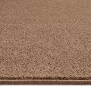 Sense Stone Washable Rug Runner- a 100% recycled polyester rug runner in a light brown.