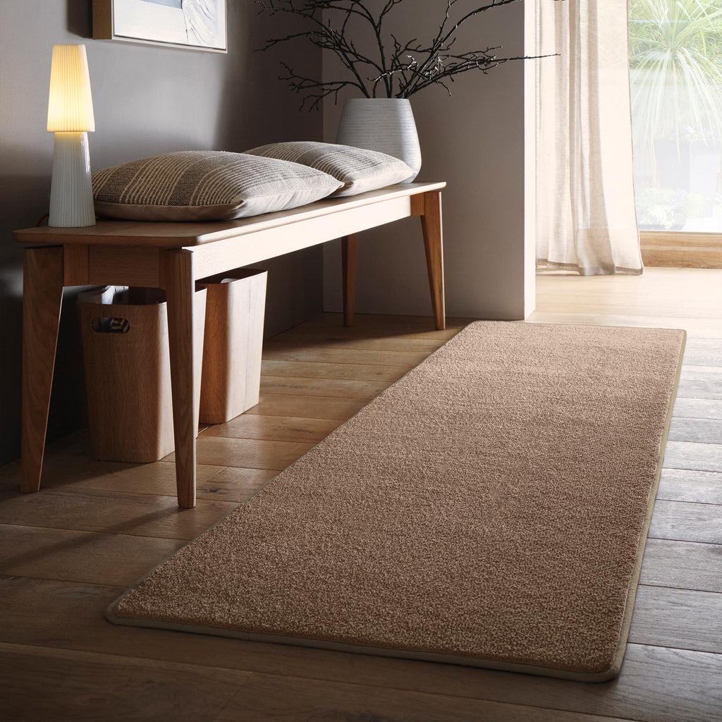 Sense Stone Washable Rug Runner- a 100% recycled polyester rug runner in a light brown.