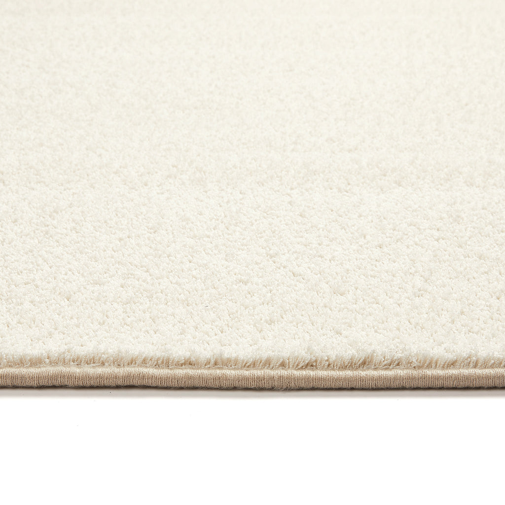 Sense Pumice Stone Washable Rug- a 100% recycled polyester rug in a solid cream colour.