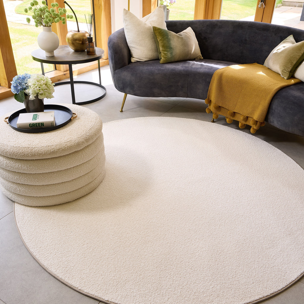 Sense Pumice Stone Washable Rug- a 100% recycled polyester rug in a solid cream colour.