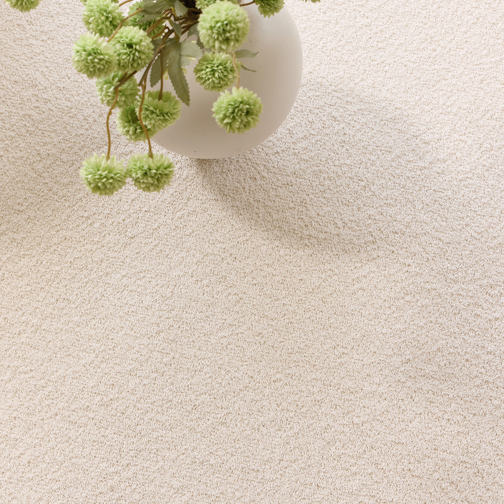 Sense Pumice Stone Washable Rug Runner- a 100% recycled polyester rug runner in cream.