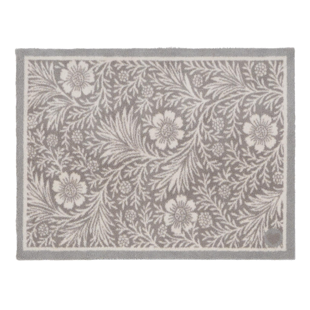 Soft Floral Washable Doormat- a cotton doormat featuring an elegant white floral pattern.