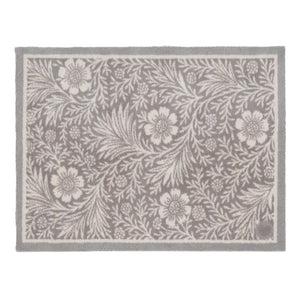 Soft Floral Washable Doormat- a cotton doormat featuring an elegant white floral pattern.