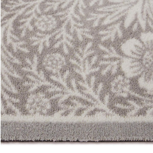 Soft Floral Washable Doormat- a cotton doormat featuring an elegant white floral pattern.