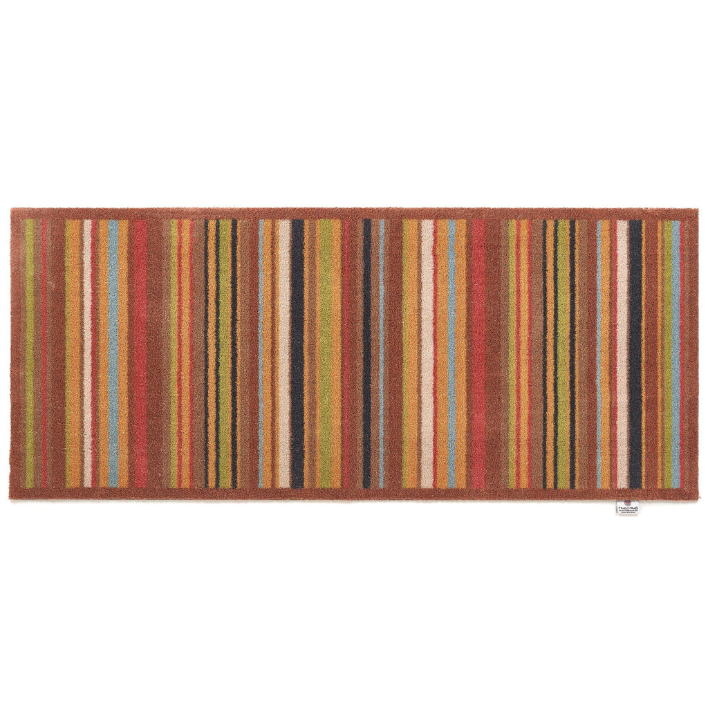 Stripe 70 Red/Blue Washable Runner- a 100% recycled cotton runner featuring vertical stripes in brown, green, red, orange, charcoal, and white.