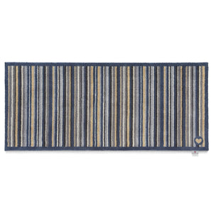 Stripe 88 Washable Runner- a 100% recycled cotton runner featuring an array of stripes in different shades of blue, grey, and beige.