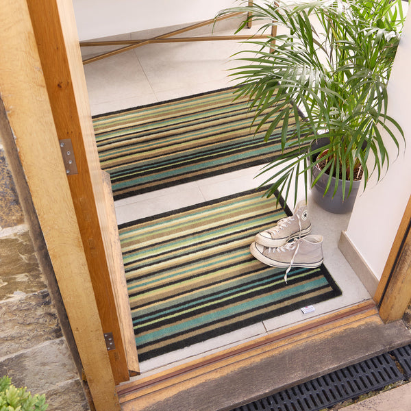 Stripe 84 Blue\Green Washable Runner- a 100% recycled cotton runner featuring horizontal stripes in navy, beige, green, and light blue.