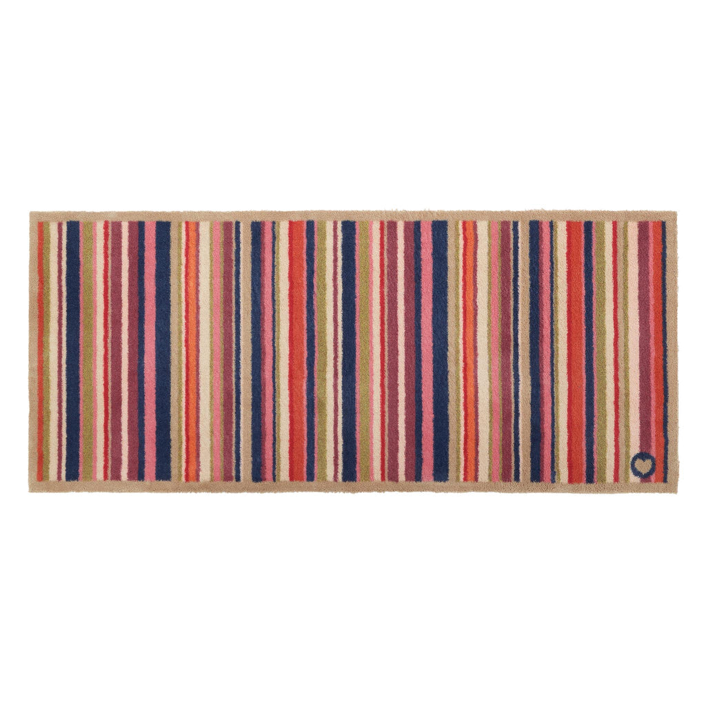 Sunset Stripe washable runner- a 100% recycled cotton runner featuring colourful stripes in pink, green, white, orange, blue, and purple.