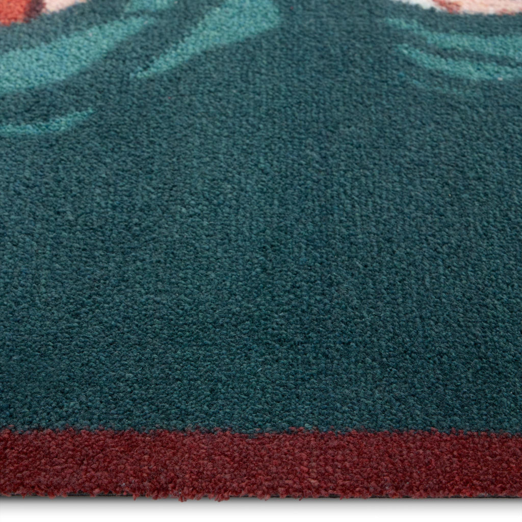 Swimming Ducks Teal Washable Runner- a 100% recycled cotton runner featuring multiple ducks swimming and creating ripples in the water.