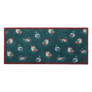 Swimming Ducks Teal Washable Runner- a 100% recycled cotton runner featuring multiple ducks swimming and creating ripples in the water.