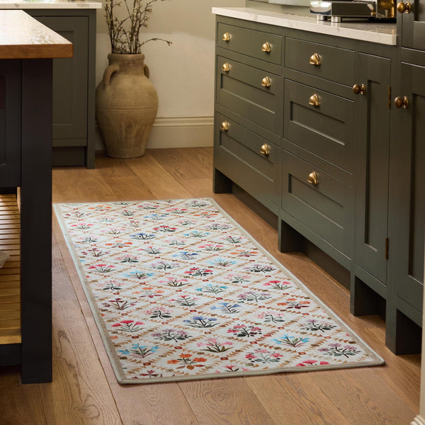 The Wildflower Patch Eco-Washable Runner- a beige eco-washable runner featuring vibrant florals.