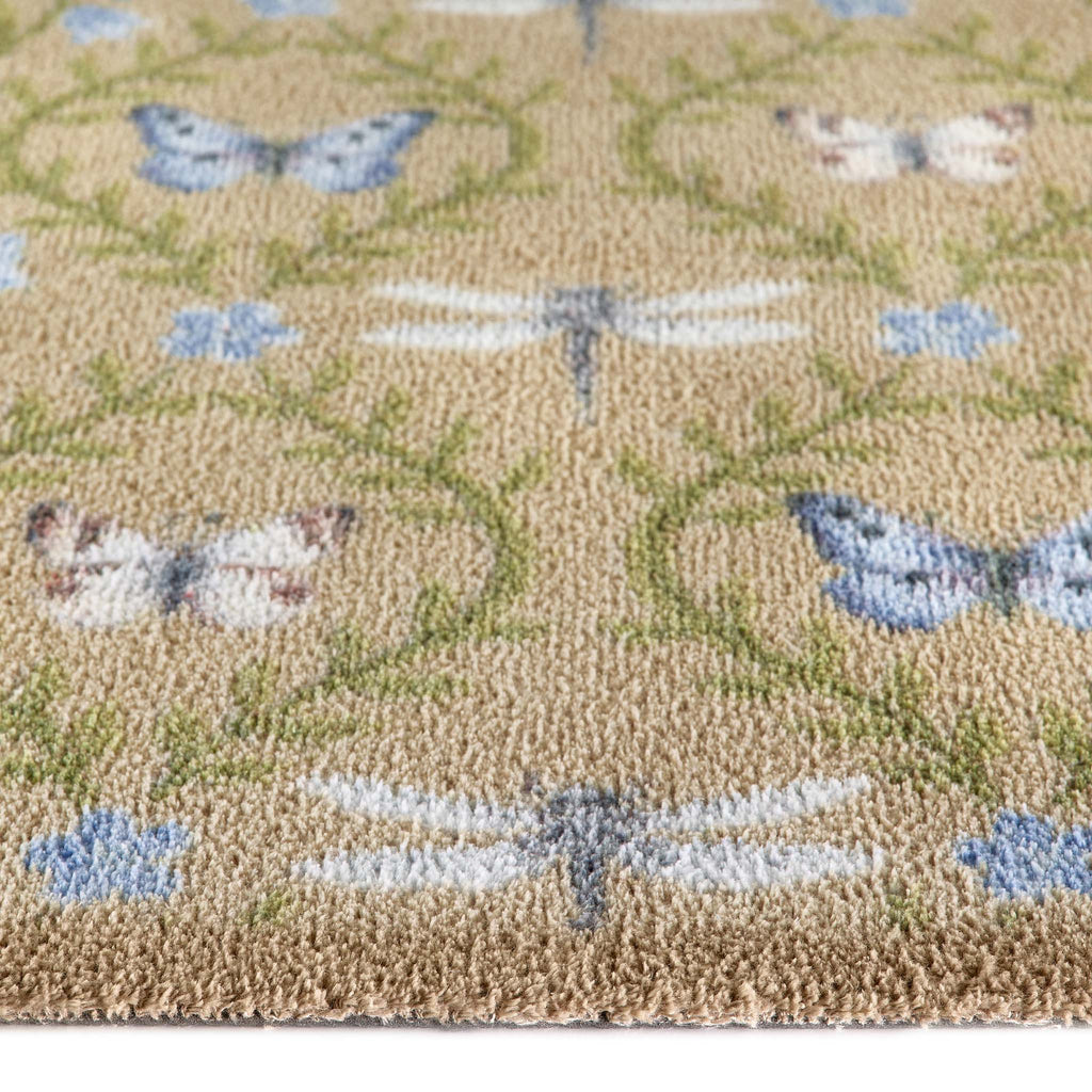 Wild Meadow Beige Green Washable Runner- a 100% recycled cotton runner featuring intertwining vines with a collection of hand-painted butterflies, dragonflies, and blue flowers.