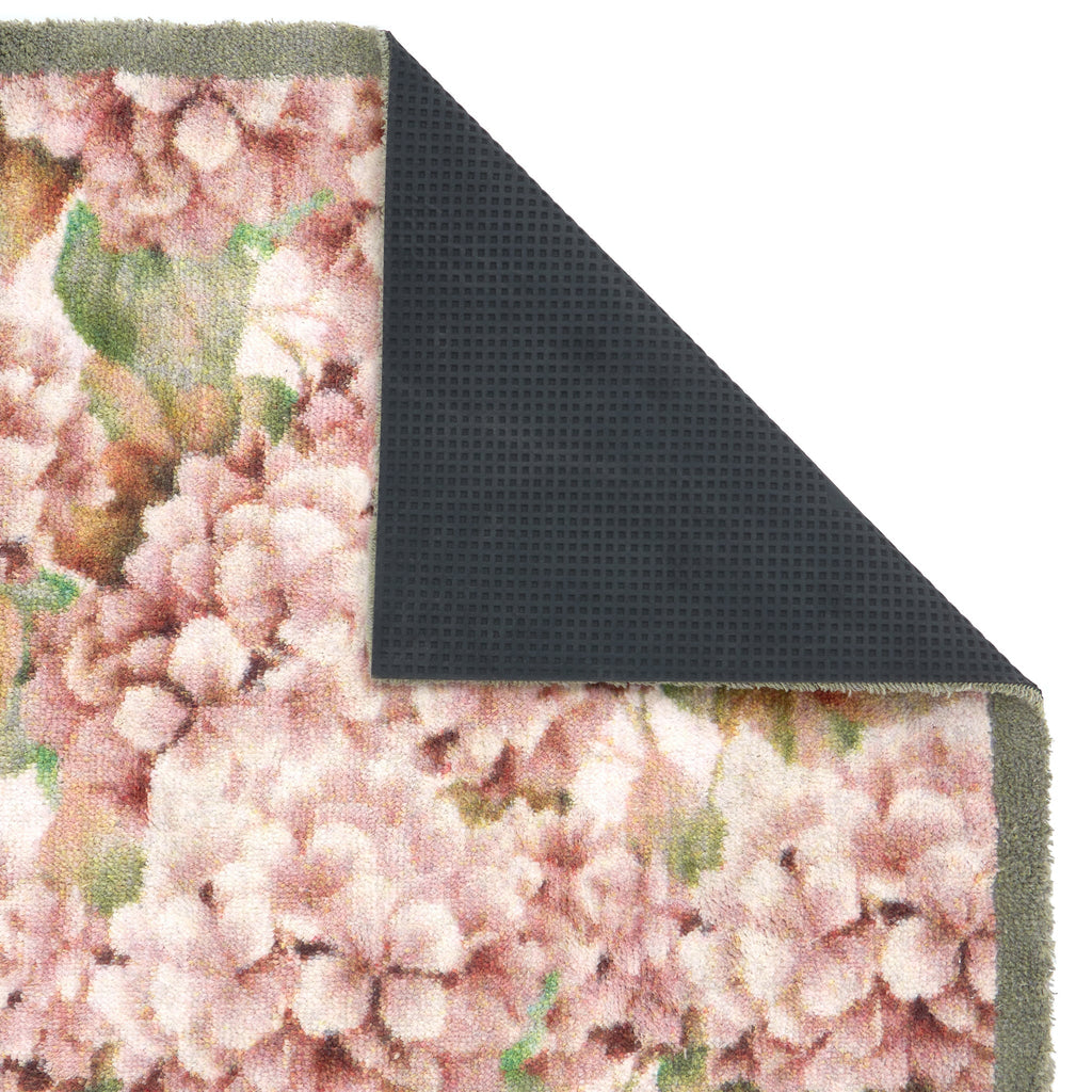 Wild Hydrangea Washable Runner- a 100% recycled cotton runner featuring hydrangea blooms in rust and soft pinks, accented with green and olive leaves.