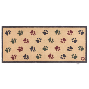 Wipe your Paws Beige Washable Runner in beige- a 100% recycled cotton runner featuring scattered paw prints in charcoal, dark green, and burgundy.