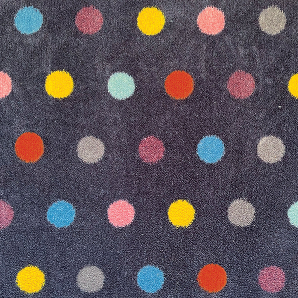 Bright Spot 1 Charity Doormat Bright Spot 1 Charity Runner- a 100% recycled cotton runner featuring a multi-coloured spot pattern in blue, yellow, pink, purple and grey.