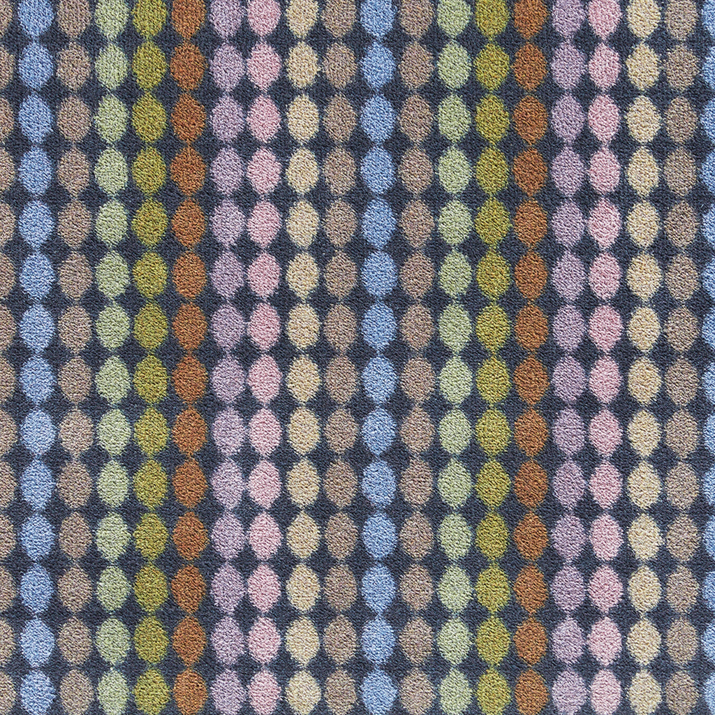 Designer 22 Washable Runner- a 100% cotton runner featuring vertical rows of rainbow-coloured spots.