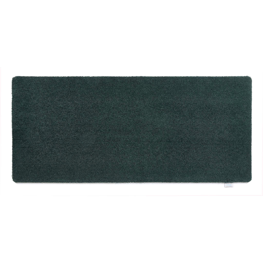 Sense Forest Green Washable Runner- a 100% recycled polyester runner in a solid green.