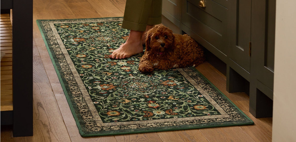 Country Paisley Green Eco-Washable Runner, styled on wooden flooring.