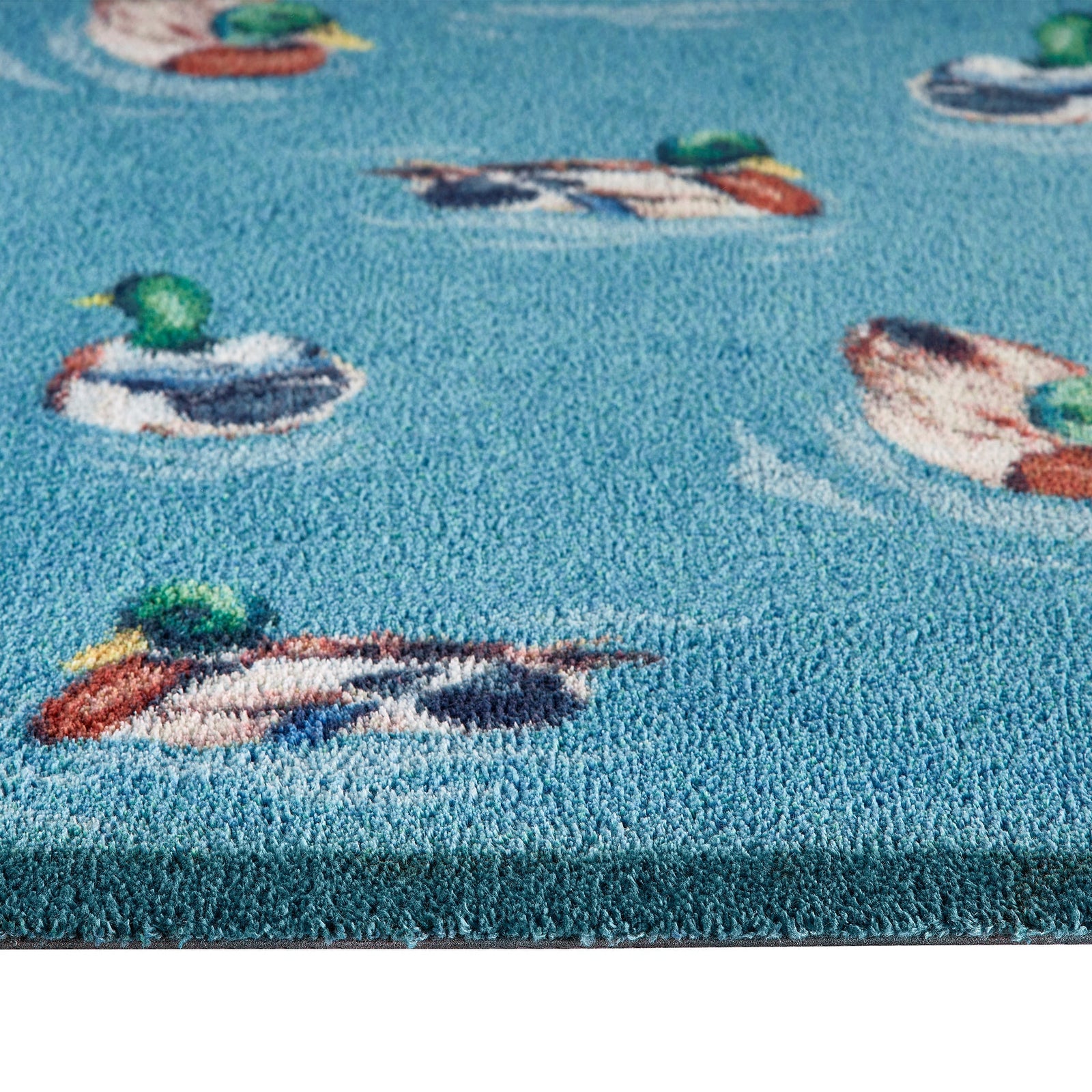 Swimming Ducks Washable Doormat made from 100% recycled cotton, featuring swimming ducks.