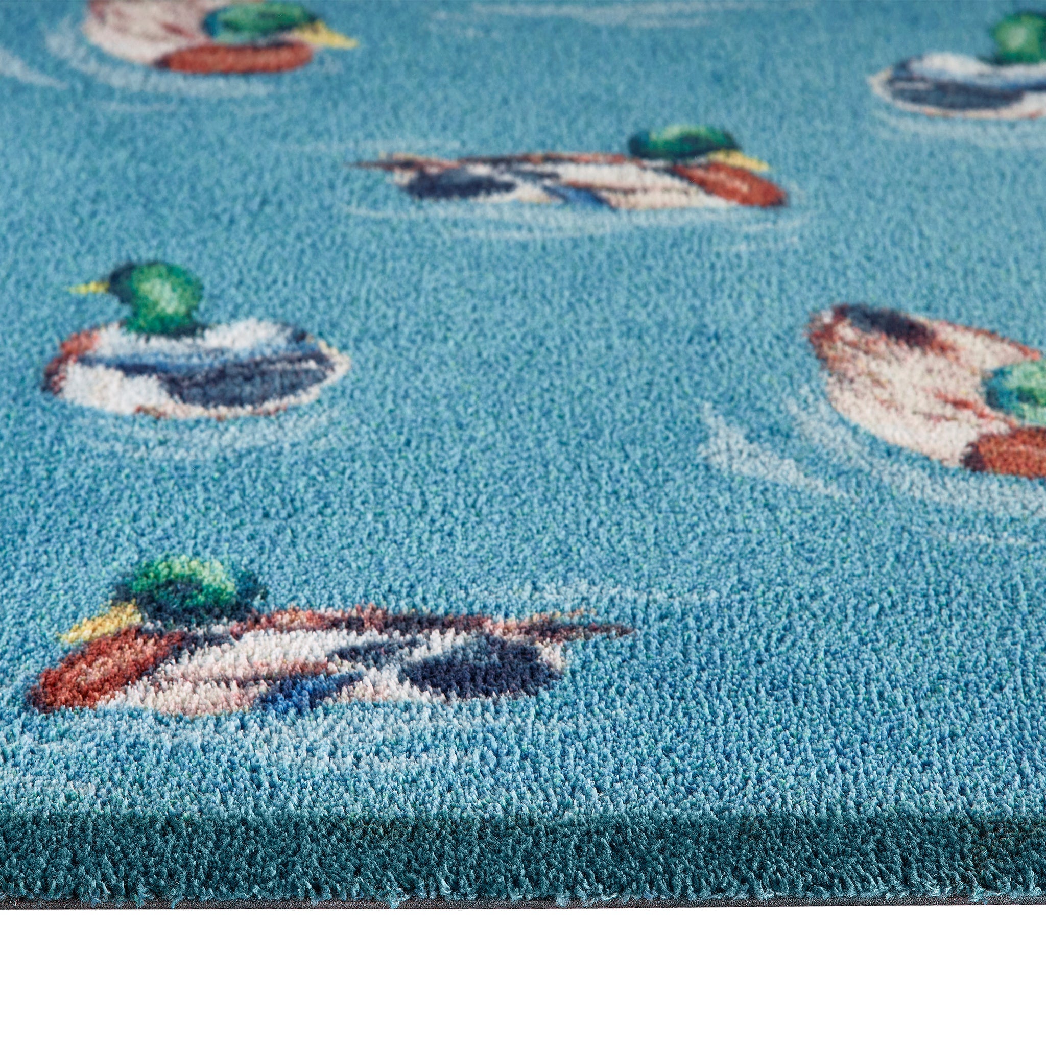 Swimming Ducks Washable Runner made from 100% recycled cotton, featuring swimming ducks. 