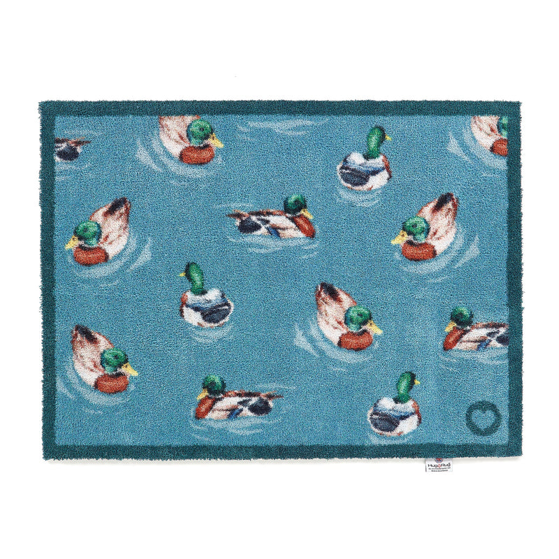 Swimming Ducks Washable Doormat made from 100% recycled cotton, featuring swimming ducks.