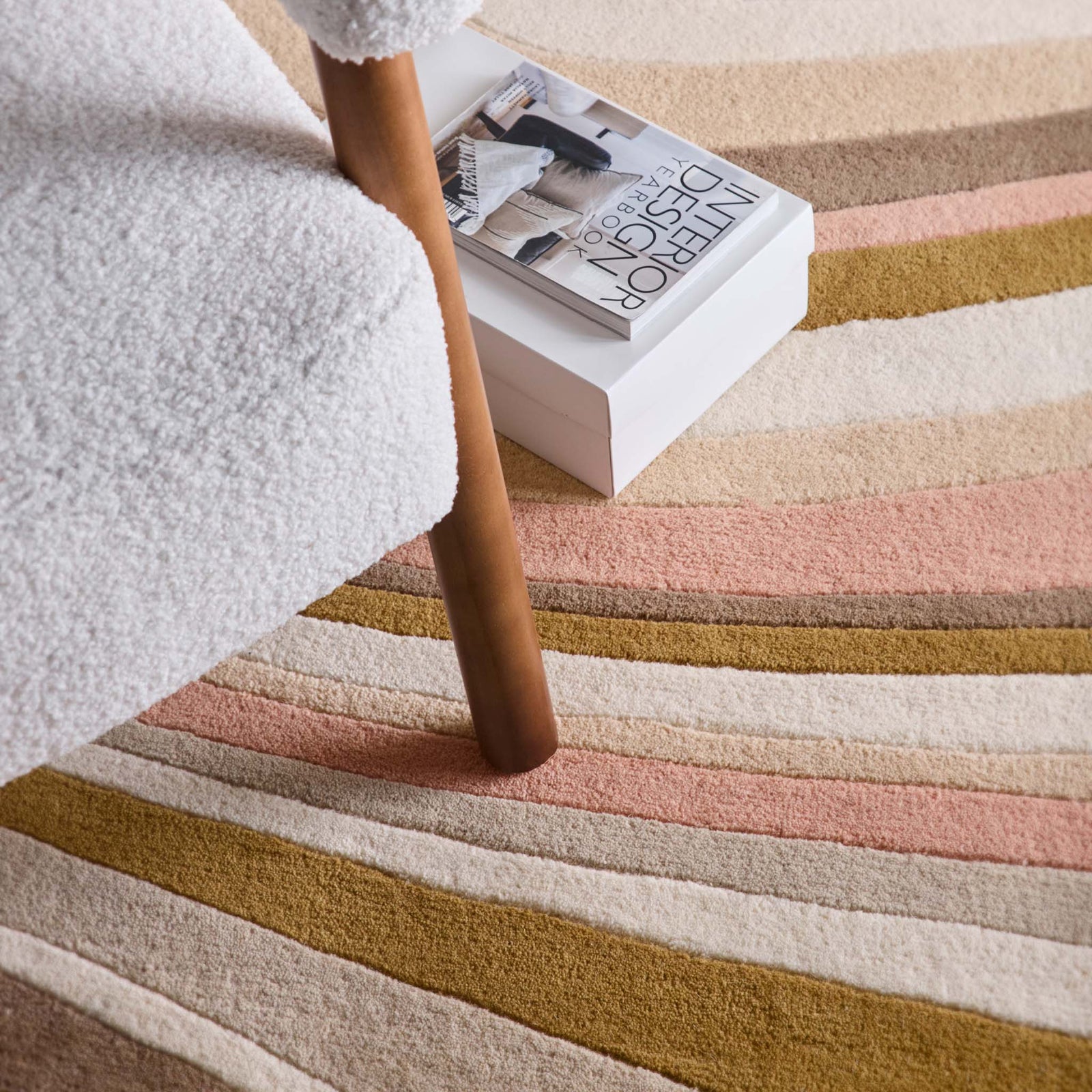 Acasta Blush Rug- 100% wool rug with a wavy design.