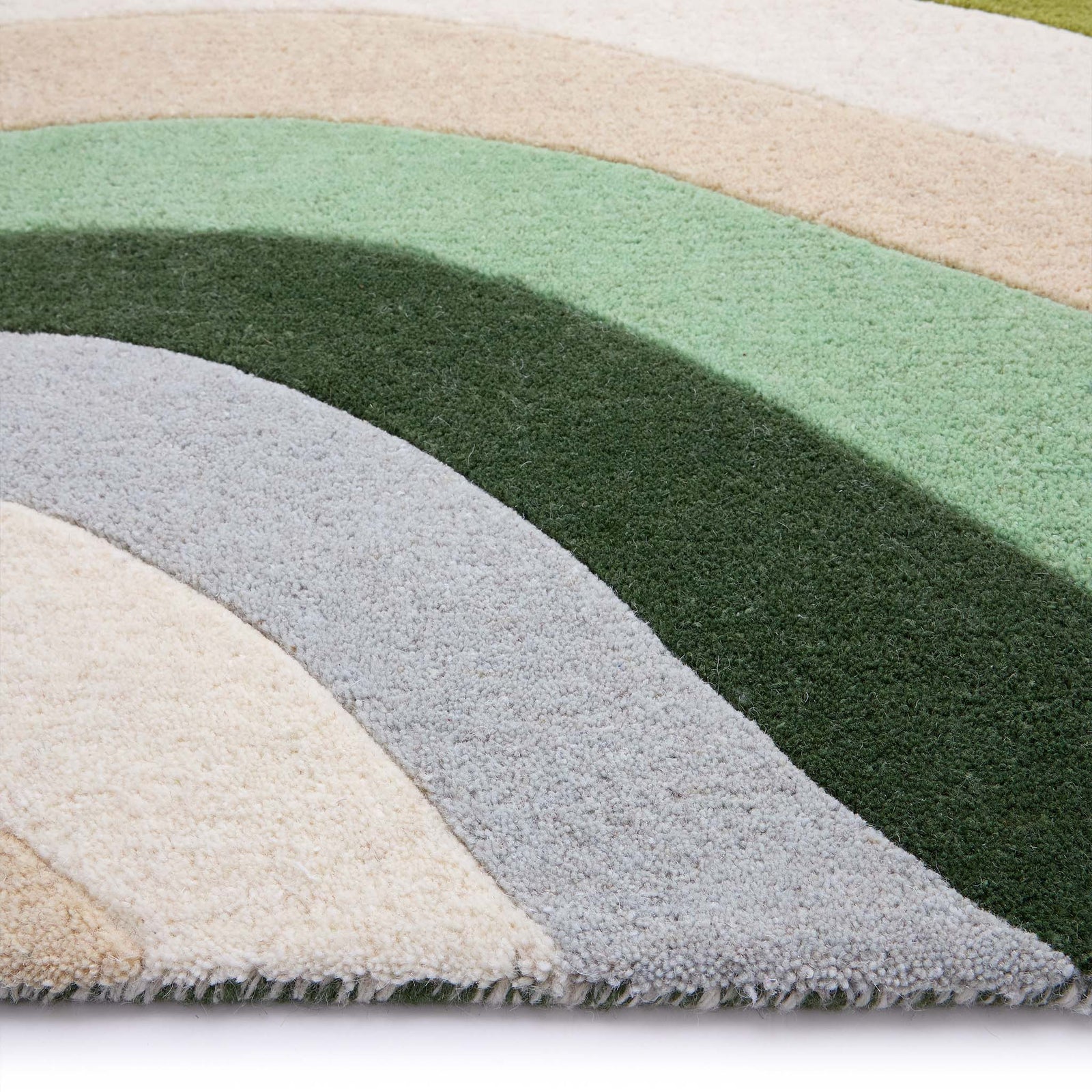 Acasta Green Rug- 100% wool rug with a wavy design.
