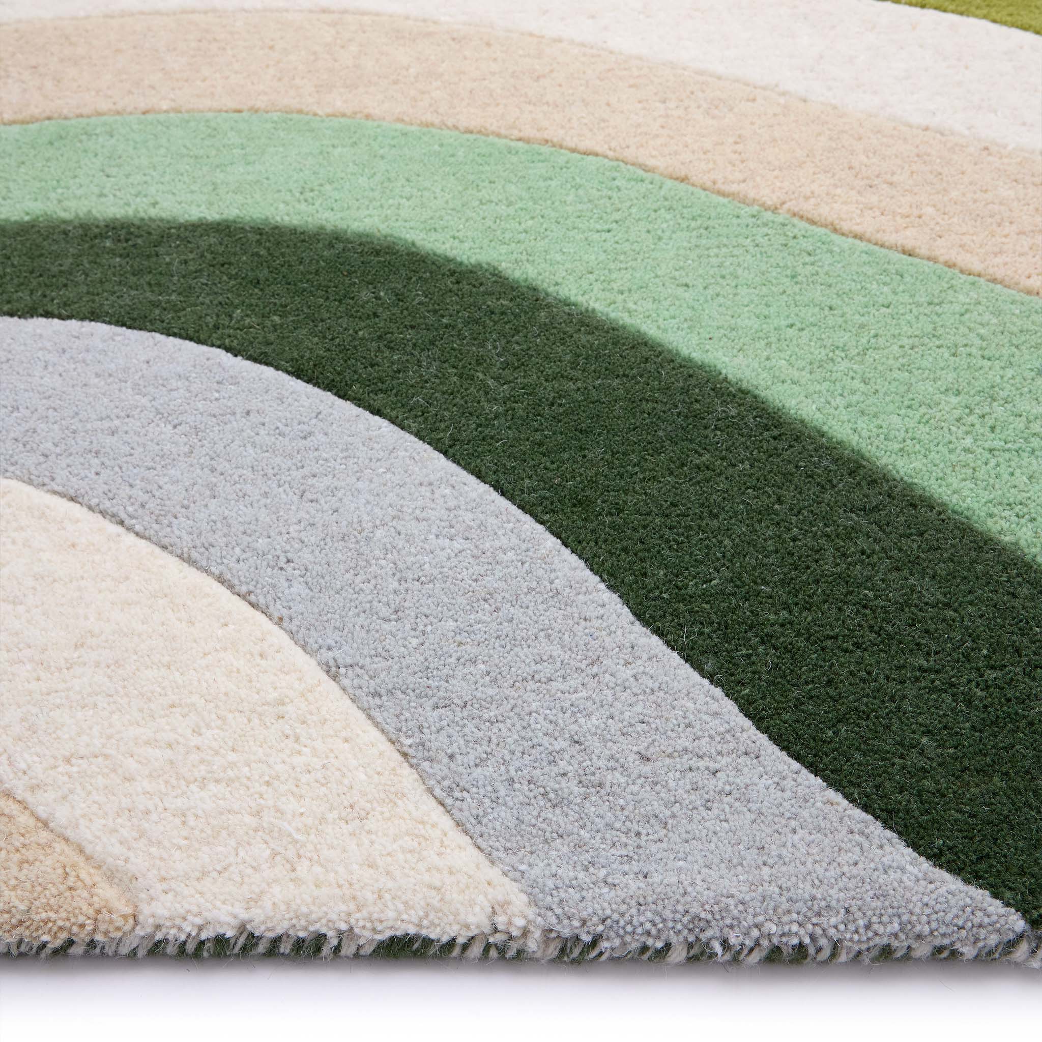 Acasta Green Rug- 100% wool rug with a wavy design.