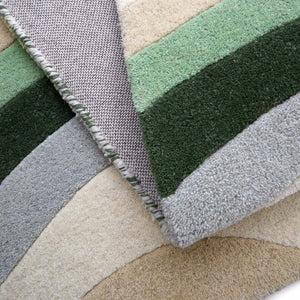 Acasta Green Rug- 100% wool rug with a wavy design.