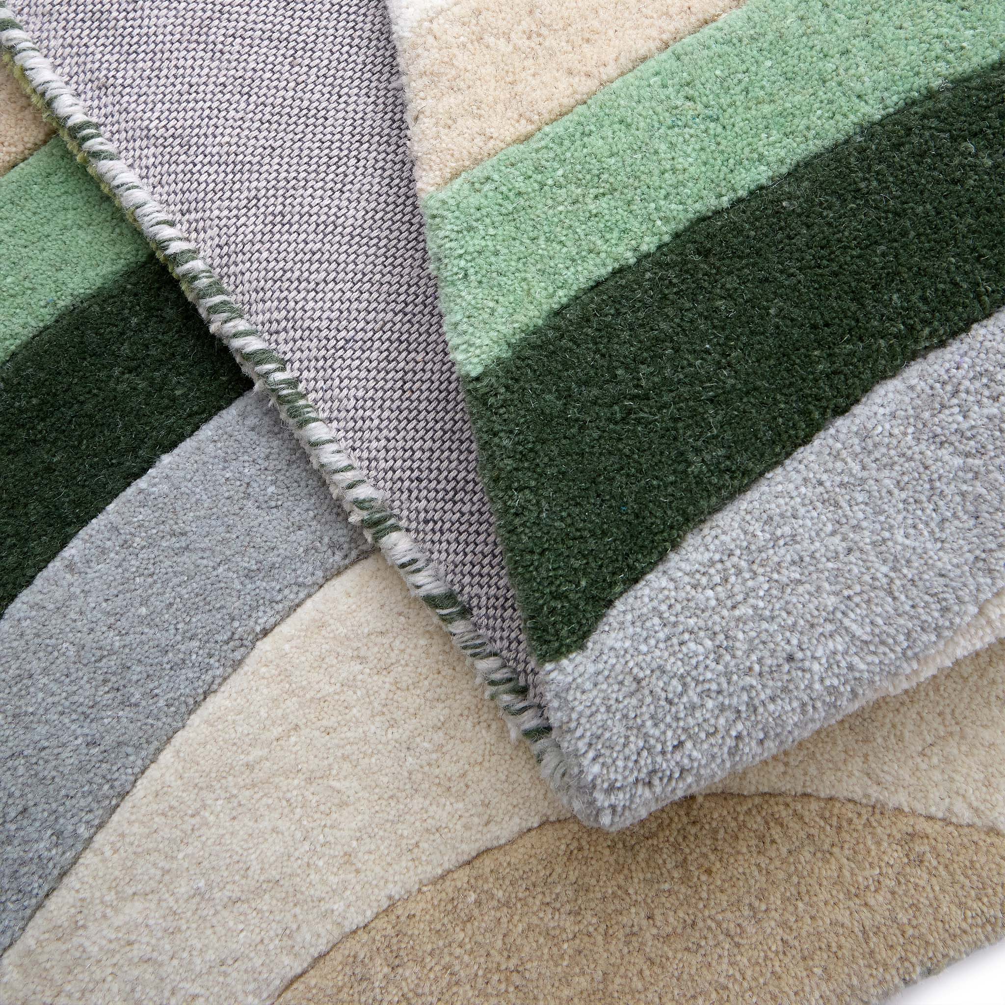 Acasta Green Rug- 100% wool rug with a wavy design.