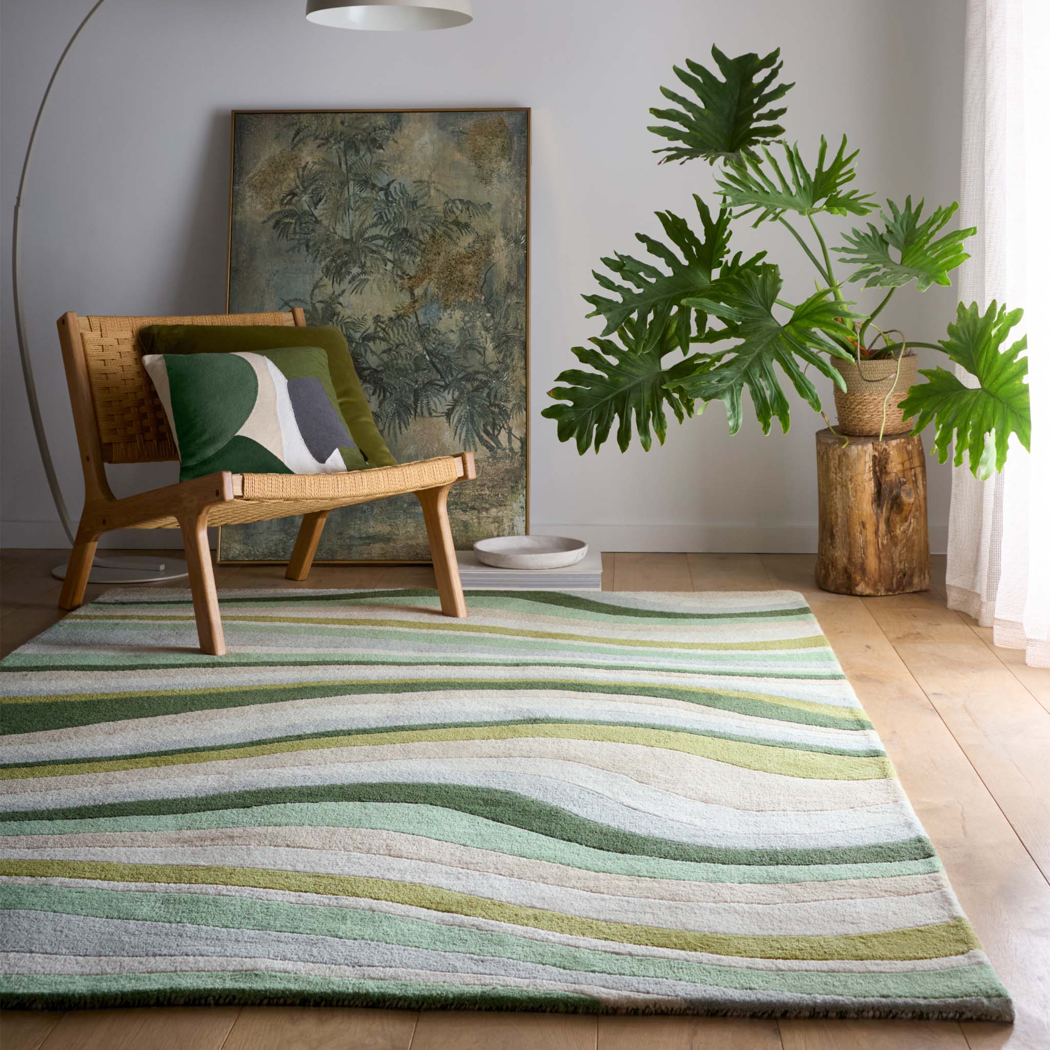 Acasta Green Rug- 100% wool rug with a wavy design.
