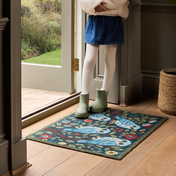 Alison Owl Washable Doormat- a cotton doormat featuring four owls surrounded by nature.