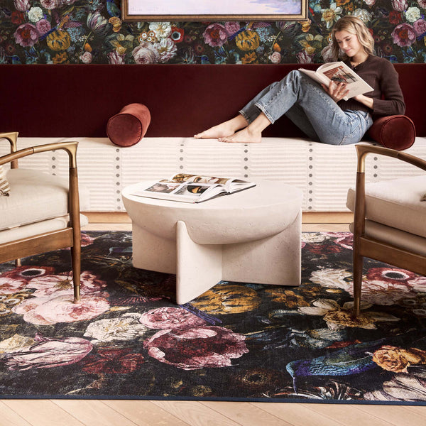 Allure Eco-Washable Rug with a floral design, styled under a table.