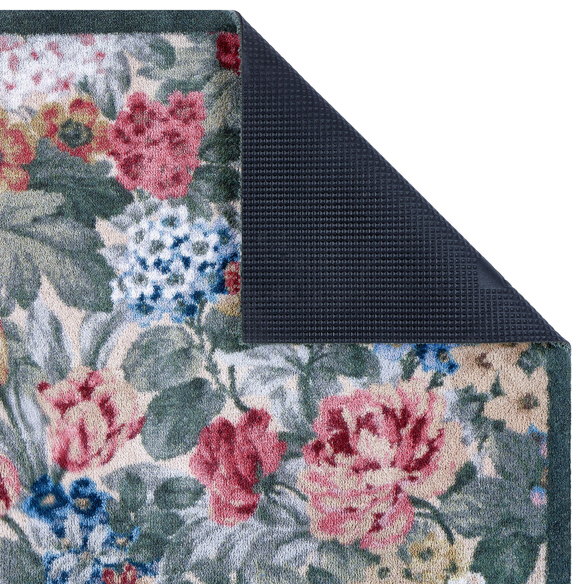 Close-up of Antique Hydrangea & Rose Chintz Washable Doormat with a floral design, showing the rubber backing.