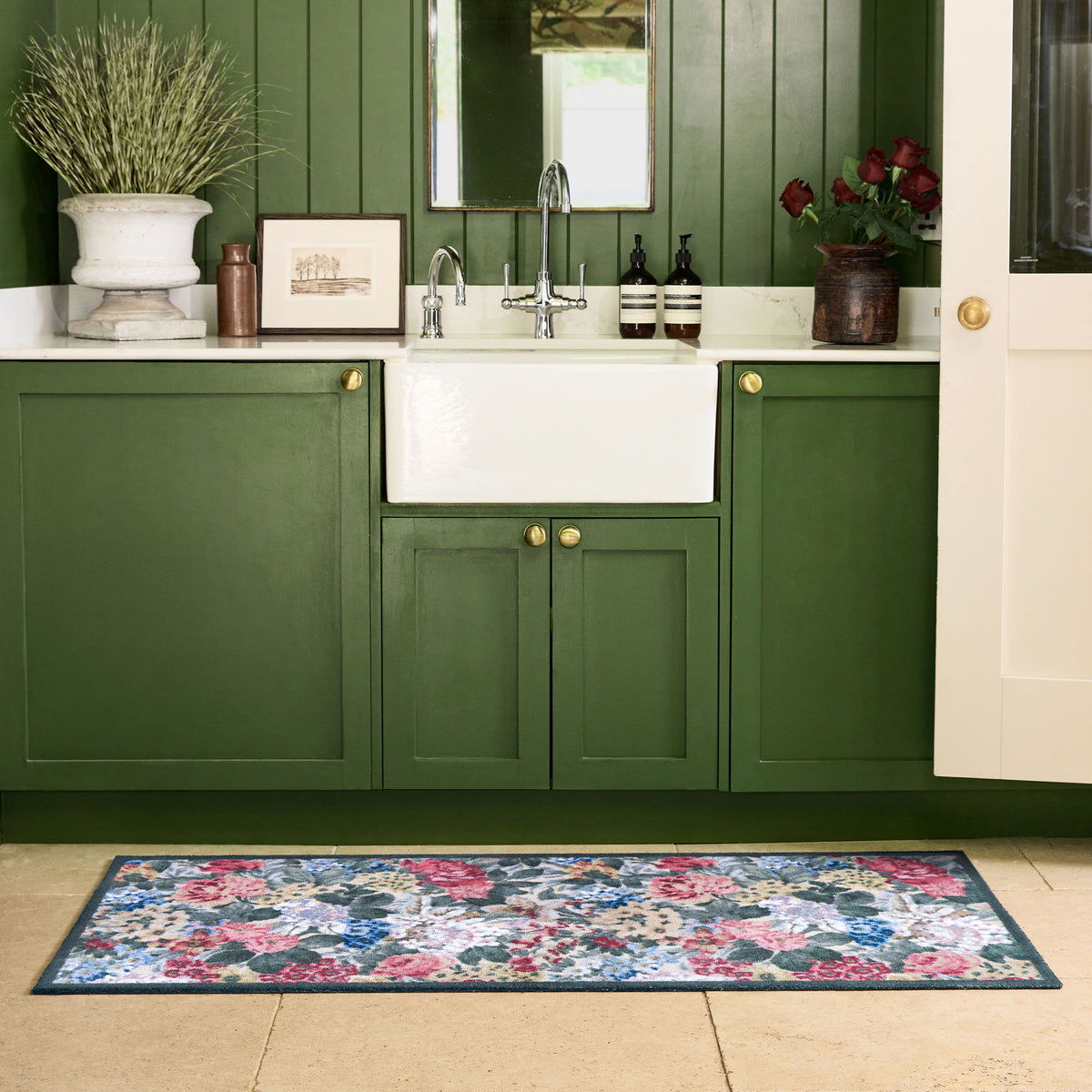 Antique Hydrangea & Rose Chintz Washable Runner with a floral design, styled by the sink. 