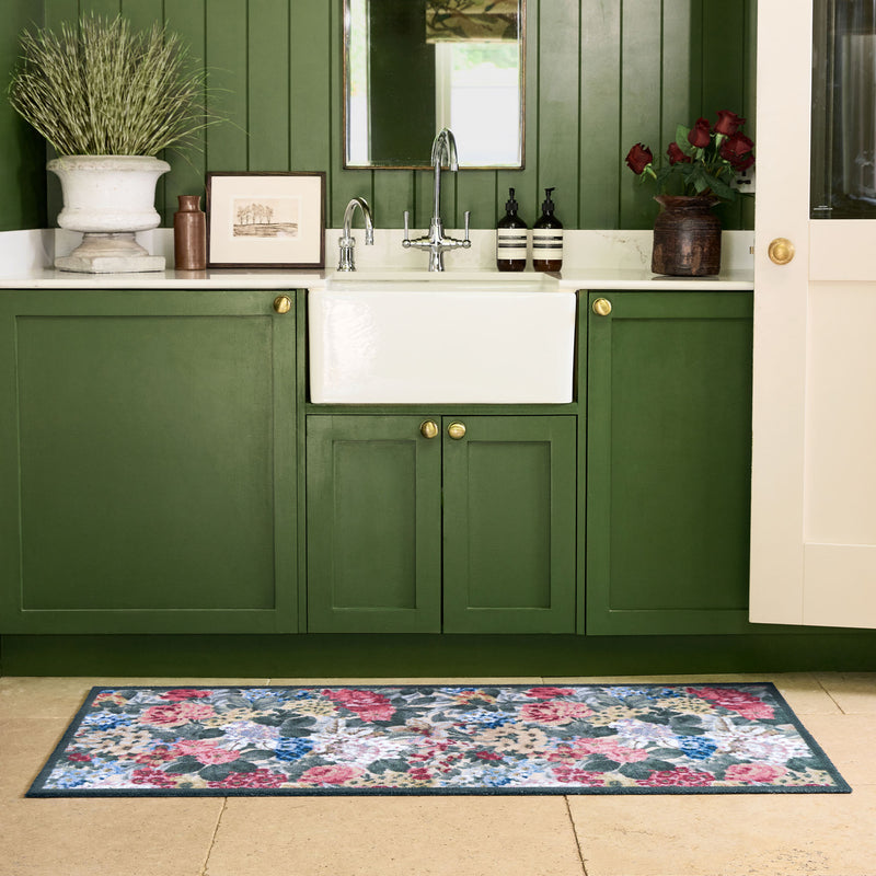 Antique Hydrangea & Rose Chintz Washable Runner with a floral design, styled by the sink. 