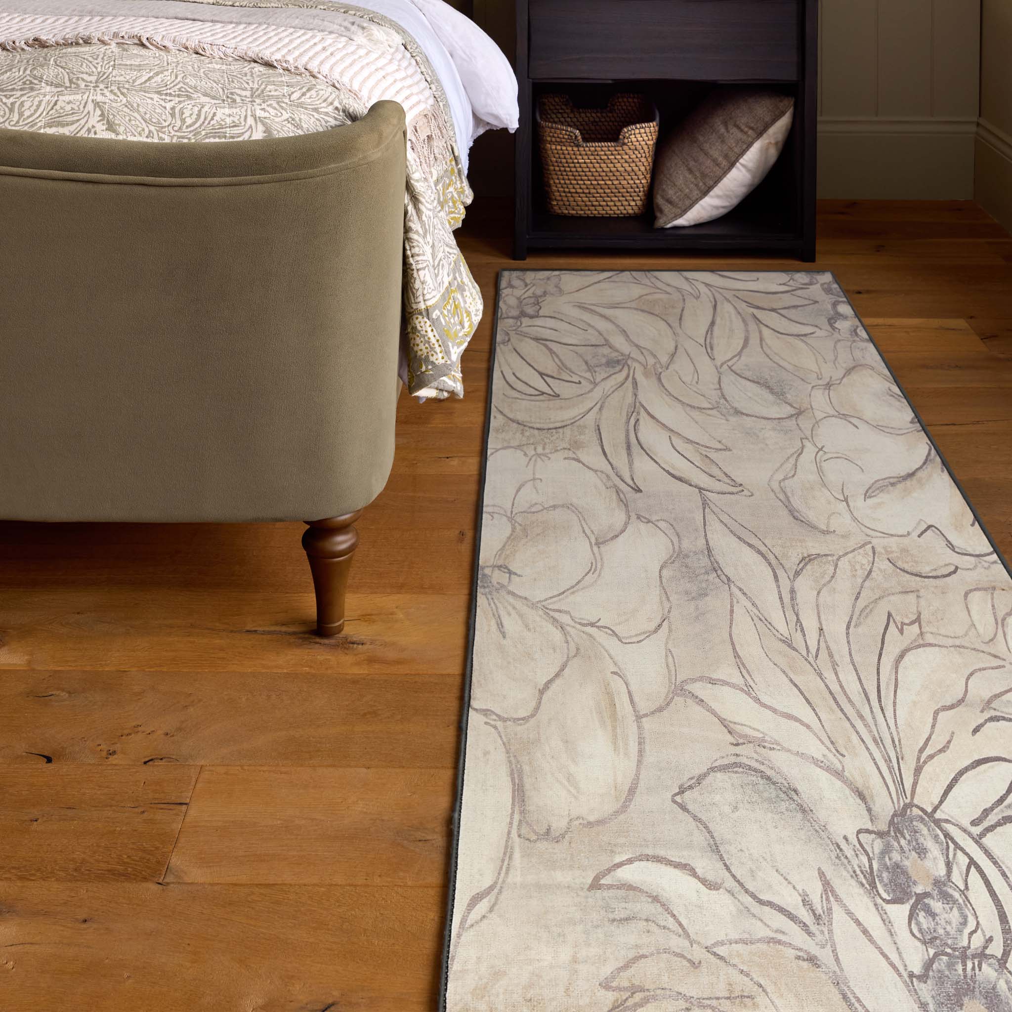 Art Floral Eco-Washable Runner with a muted floral design, styled in a bedroom.