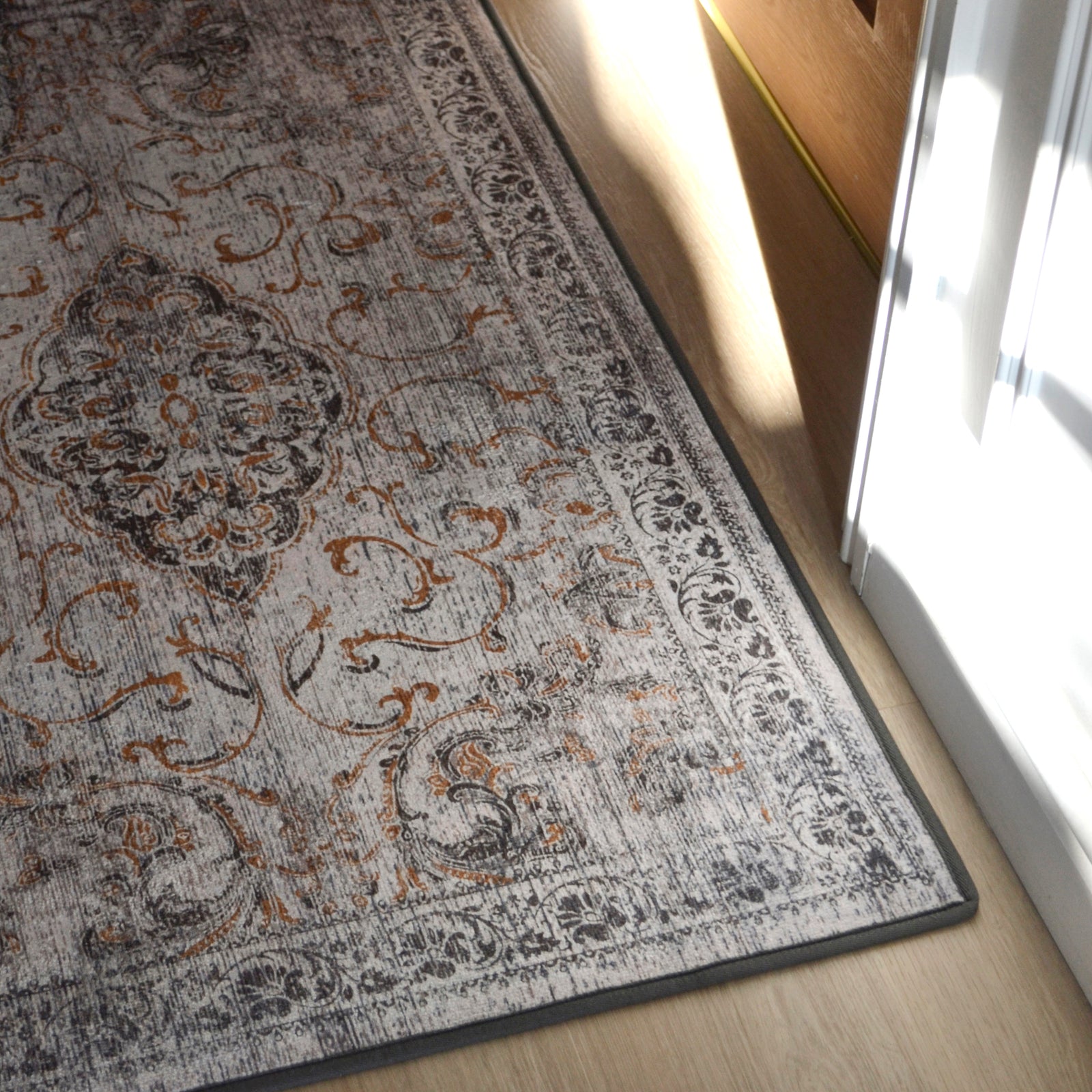 Close-up of the Baroque Eco‑Washable Runner showing a textured ornate pattern.