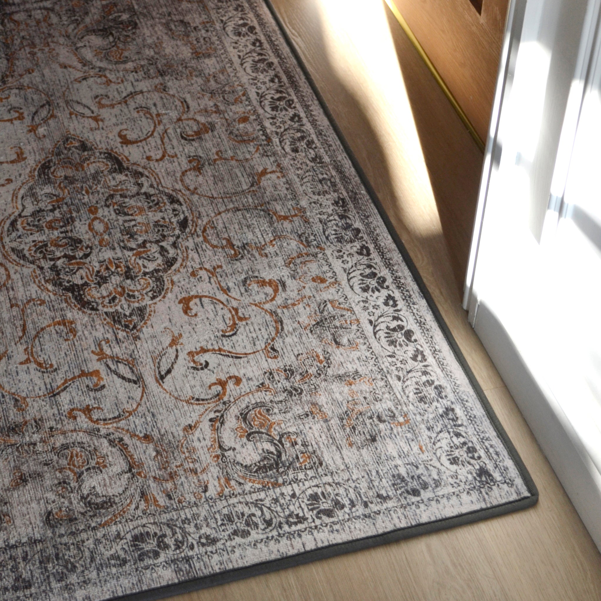 Close-up of the Baroque Eco‑Washable Runner showing a textured ornate pattern.