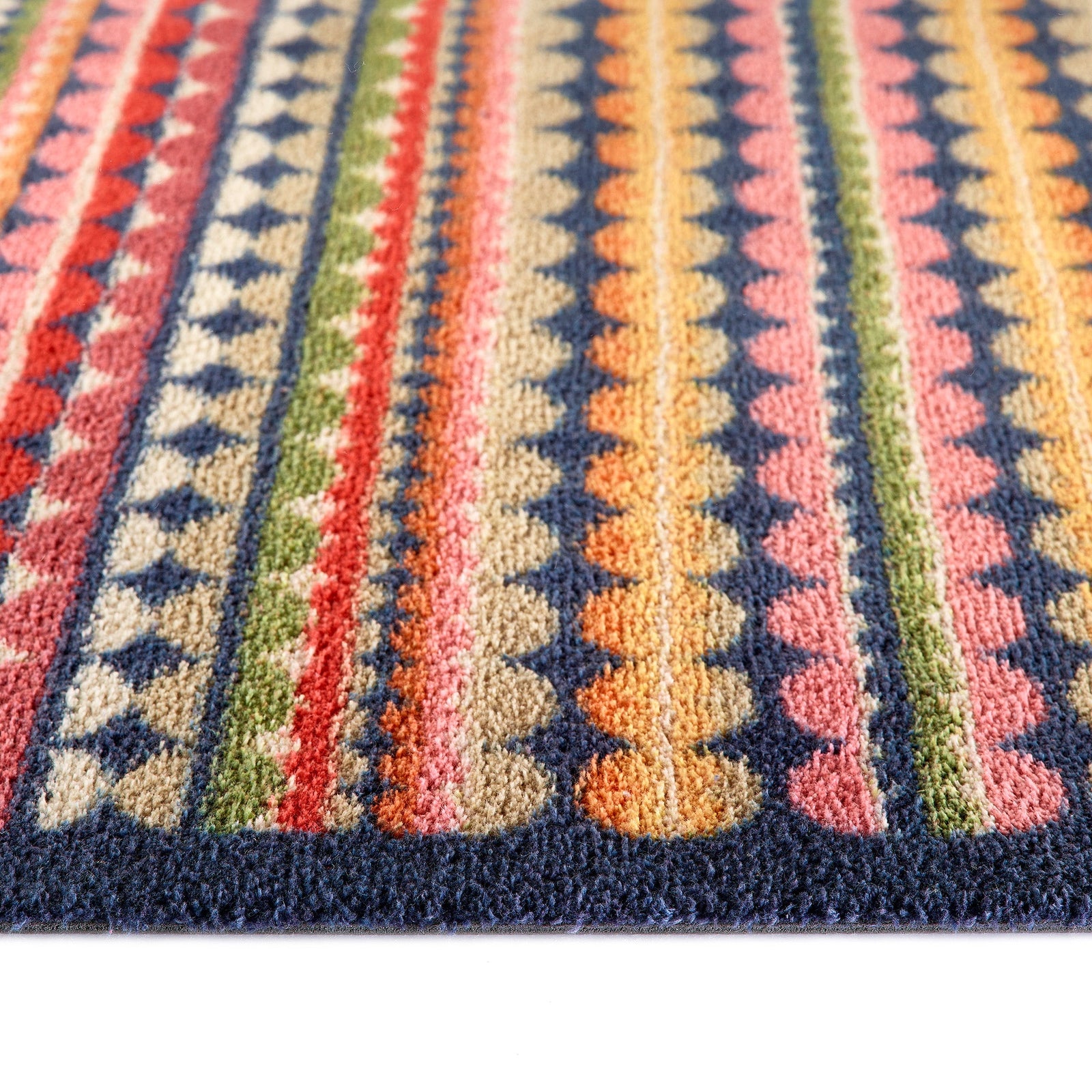 Beady Stripe Charity Runner- a 100% recycled cotton runner featuring multi-coloured stripe pattern in navy, red, pink, orange, green, white and beige.