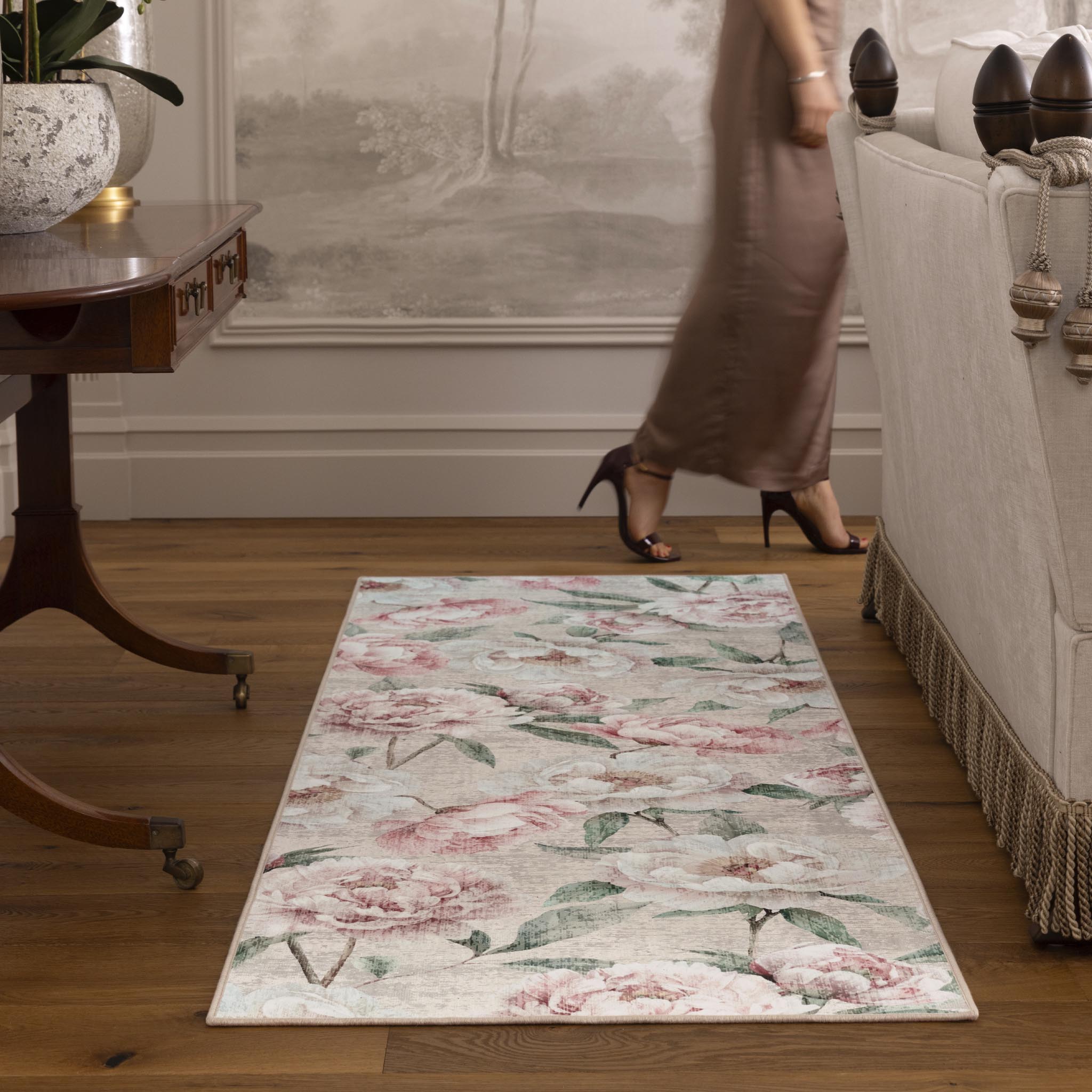 Blooming Peonies Pink Eco-Washable Runner with an floral bloom design, styled by the sofa.