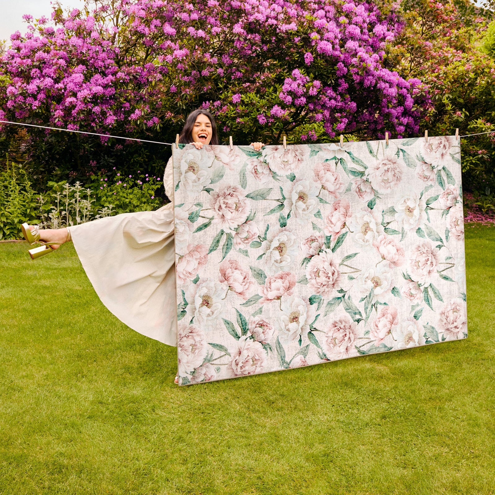 Blooming Peonies Pink Eco-Washable Rug made from 100% recycled materials, featuring pink peonies against a pink background.