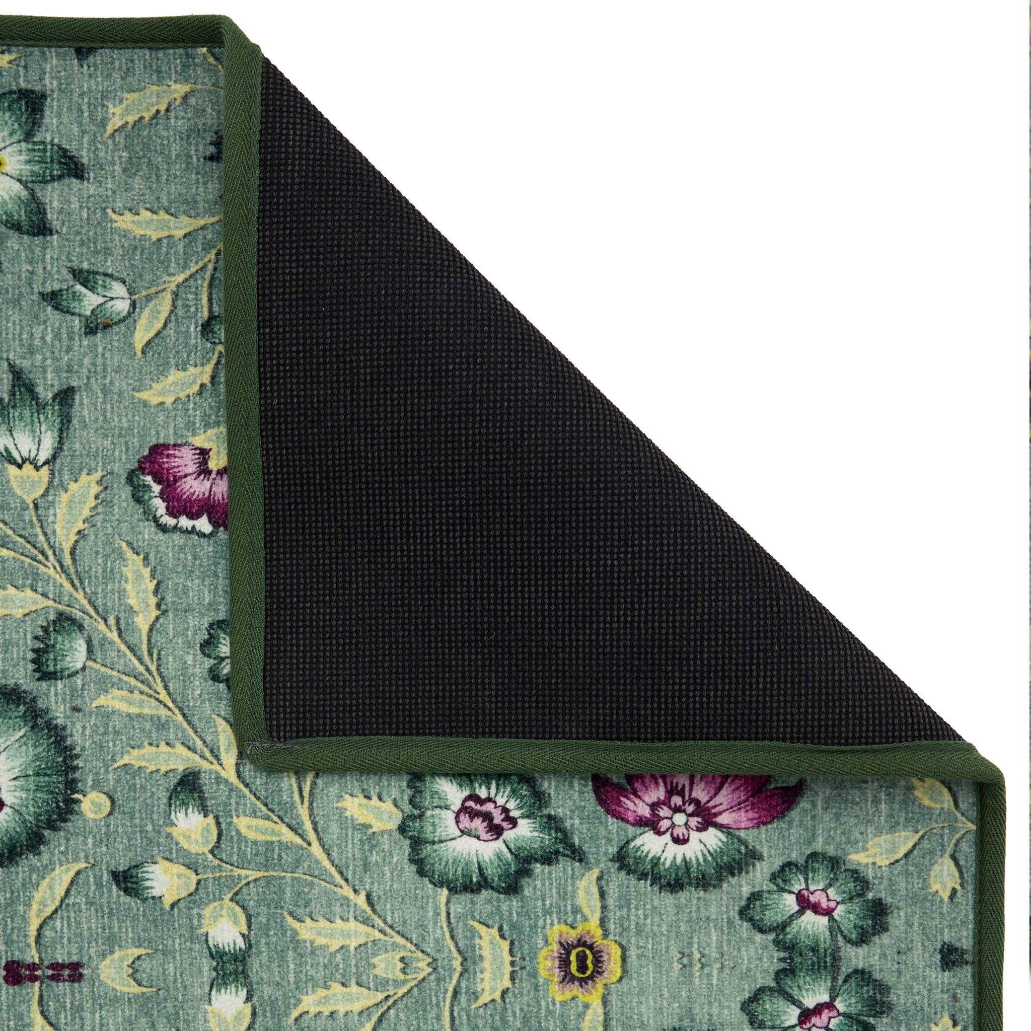 Blossoming Vines Eco-Washable Rug- a green eco-washable rug featuring colourful florals and green leaves. 