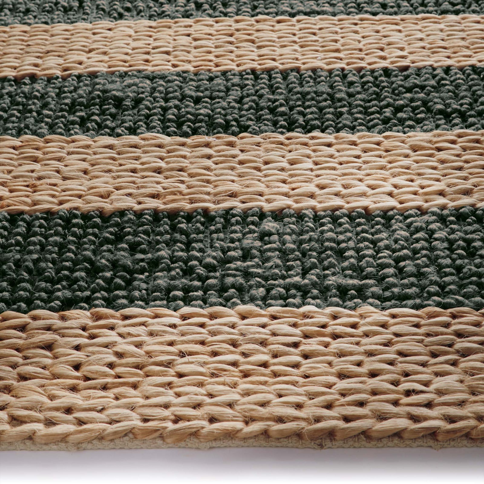 Close-up of Bondi Jute Stripe Natural/Bottle Green Rug with a green stripe design.