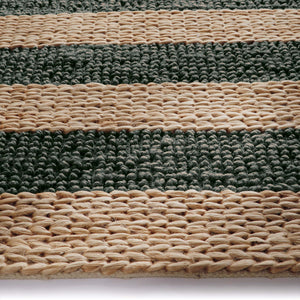 Close-up of Bondi Jute Stripe Natural/Bottle Green Rug with a green stripe design.